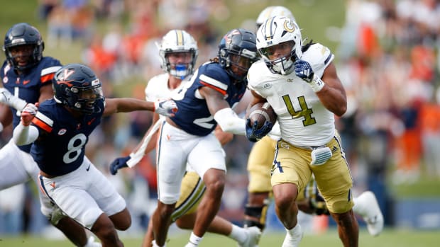 Dontae Smith running the football against Virginia